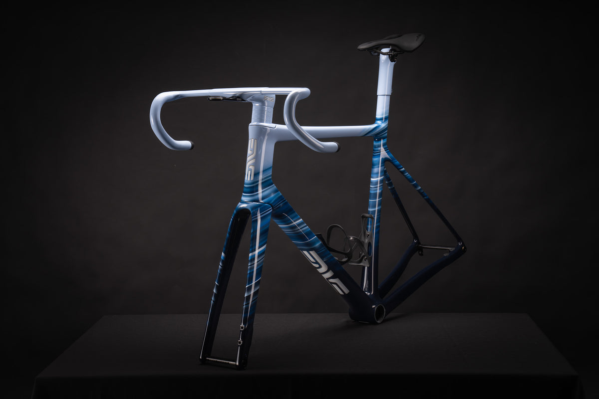 ENVE Custom Road frame with coordinated pale blue cockpit and flowing blue paint graphics